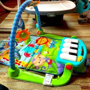 Fisher price kick and play activity center